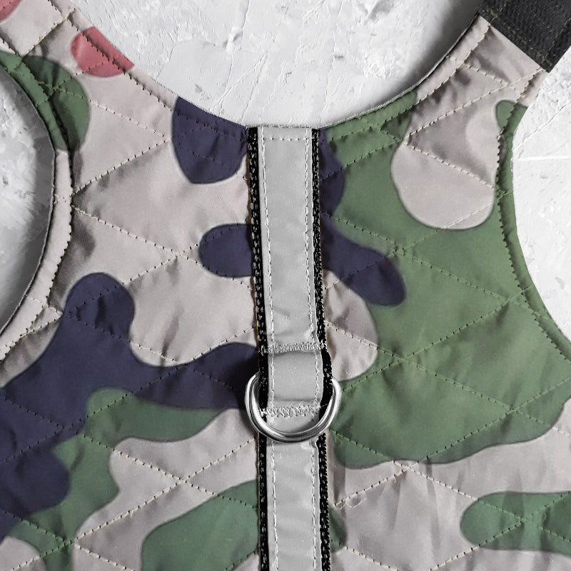A quilted camo cat harness with reflective silver stripe