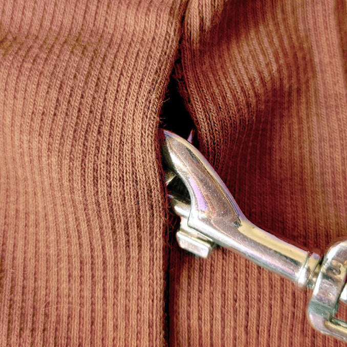 A ginger cotton sweater designed for a pet is shown on a white background
