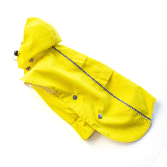 Bright yellow cat raincoat with a removable hood, reflective stripes and grey snap closures.