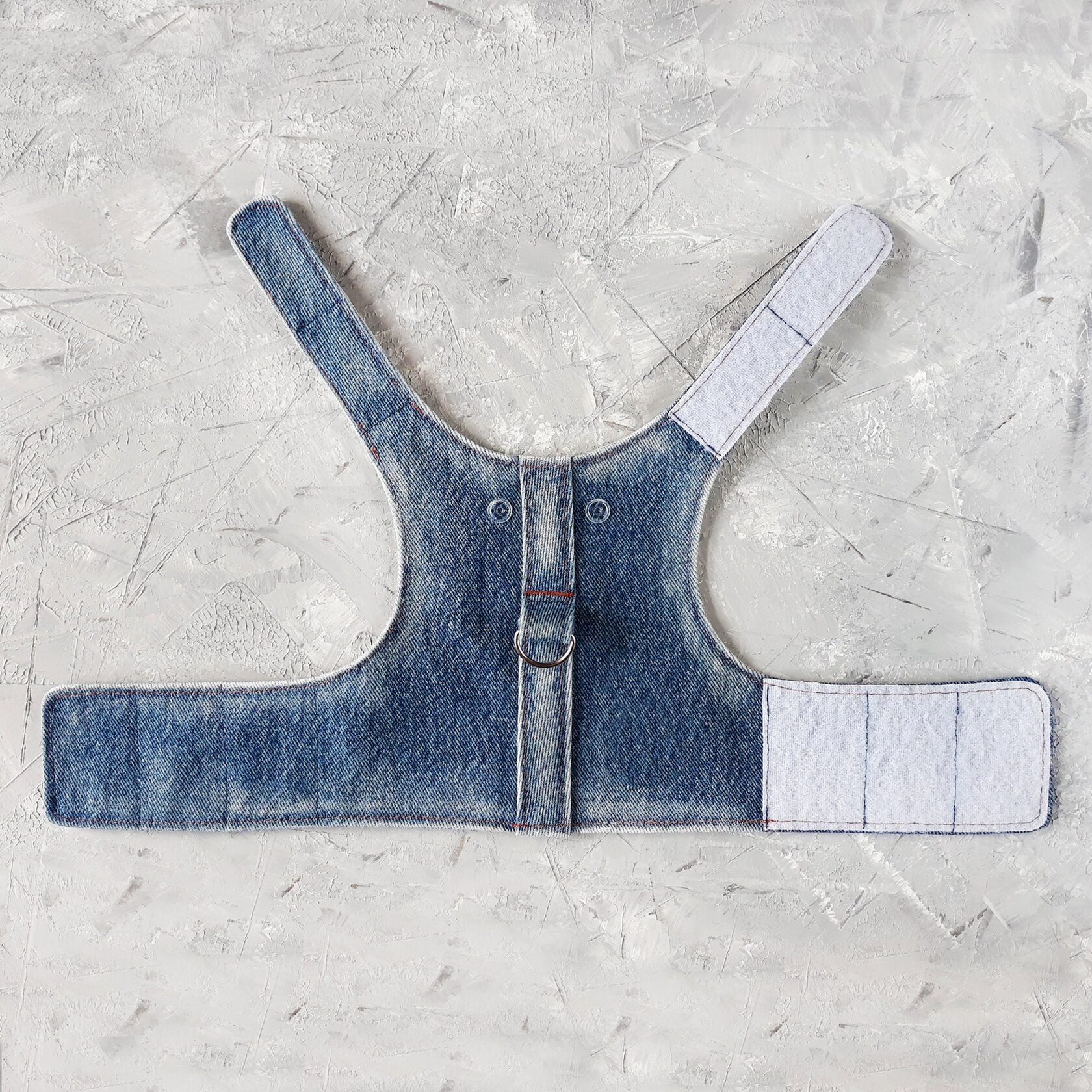 Flat Lay: Secure & Stylish Upcycling Denim Cat Harness with Removable Angel Wings - Shop Our Escape-Proof Cat Fashion!
