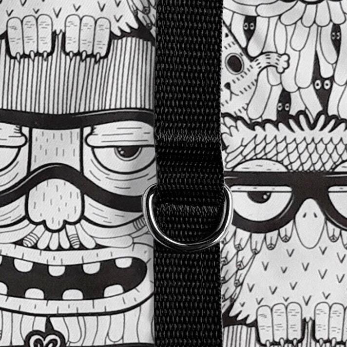 Cat harness with a cartoon owl pattern, cork side panels, a central black strap