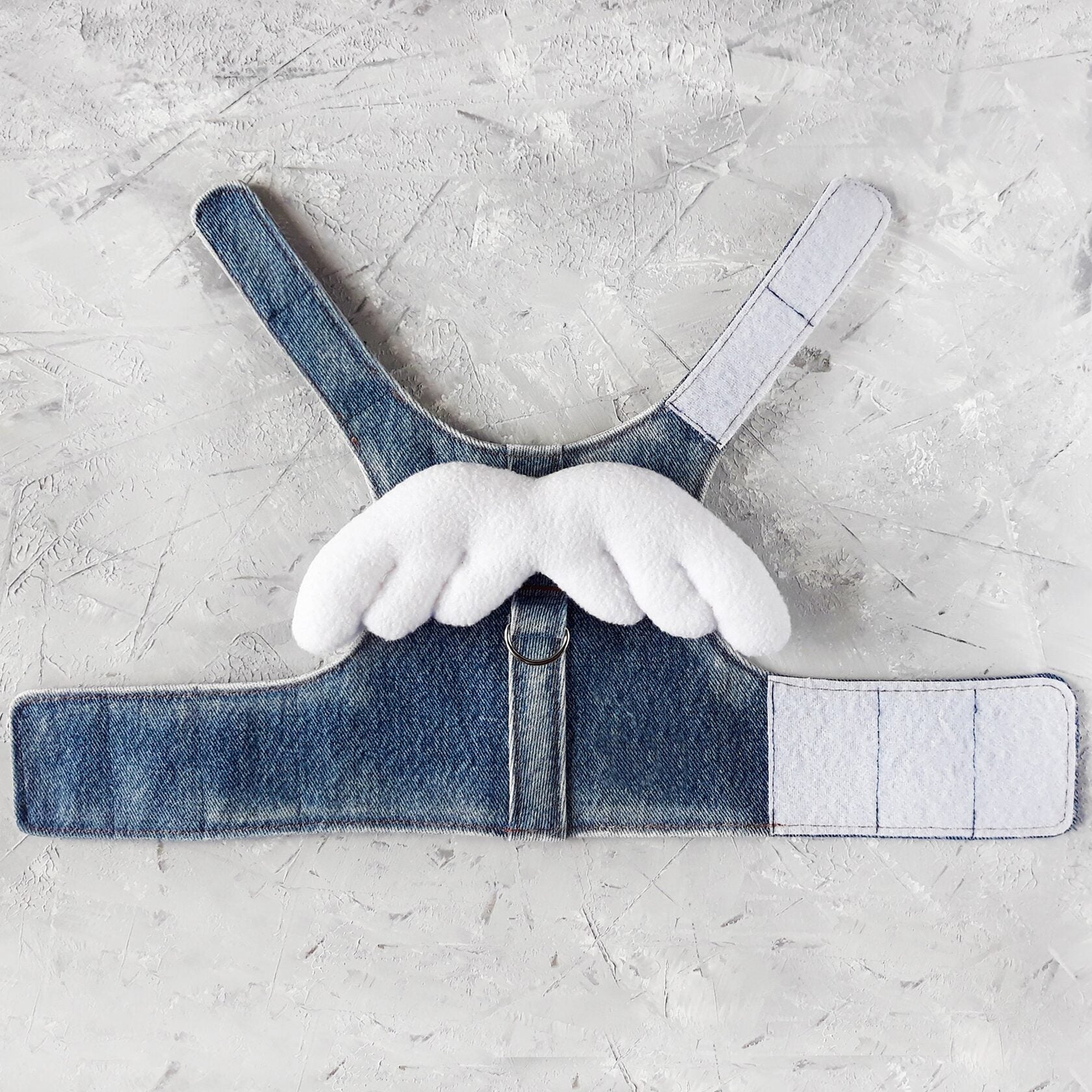 Flat Lay: Secure & Stylish Upcycling Denim Cat Harness with Removable Angel Wings - Shop Our Escape-Proof Cat Fashion!