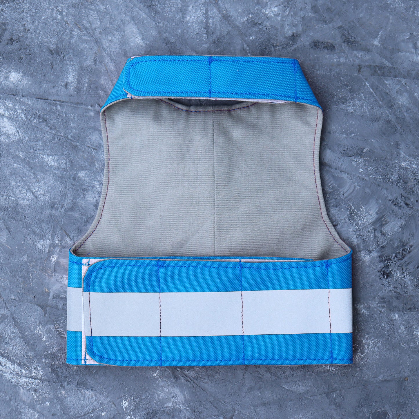 Escape proof high visibility water-repellent safety cat harness with reflective stripes. Sky blue. AirTag Pocket optional