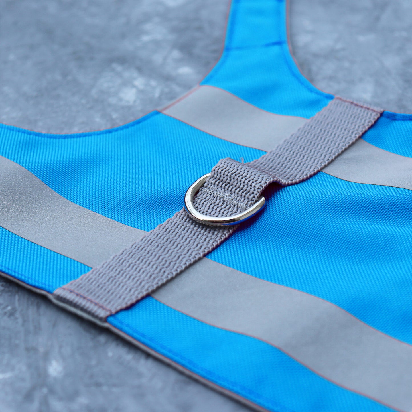 Escape proof high visibility water-repellent safety cat harness with reflective stripes. Sky blue. AirTag Pocket optional