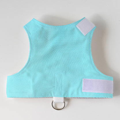 Light blue vest with white patches on a light gray background